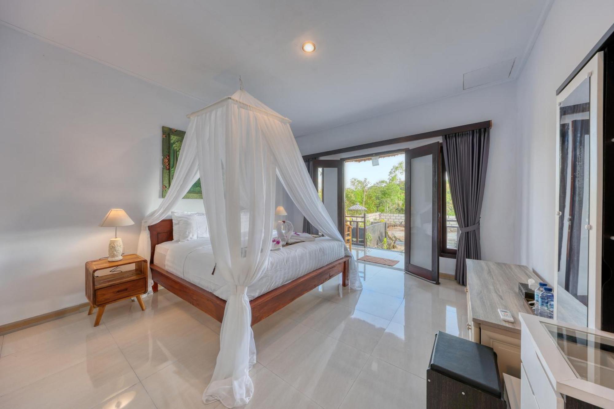 Mt Penida Bungalow Toyapakeh Номер фото
