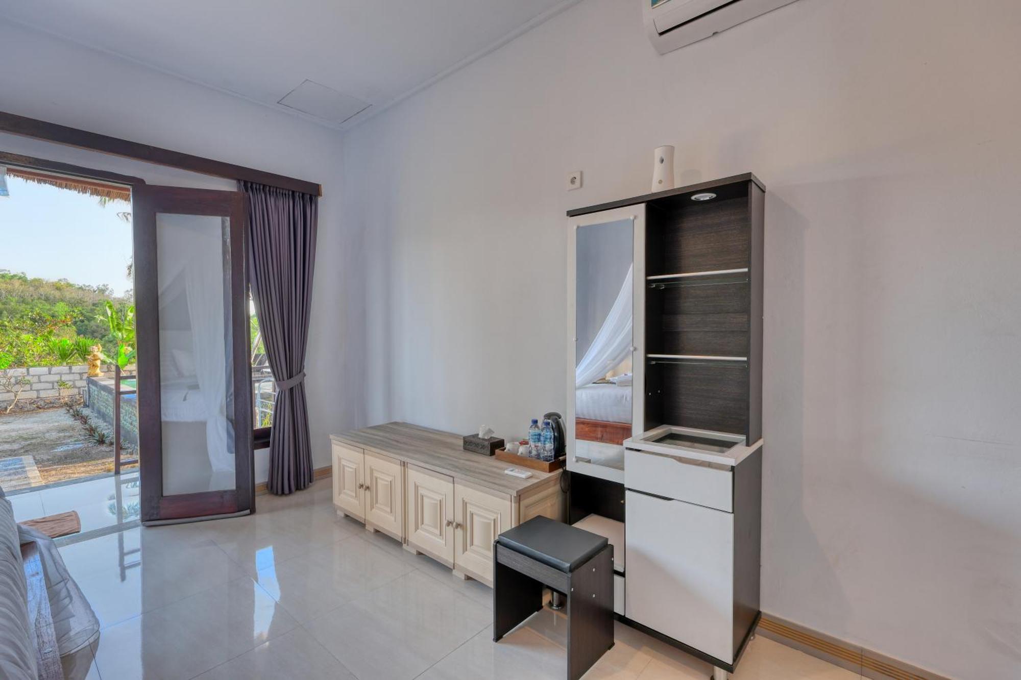 Mt Penida Bungalow Toyapakeh Номер фото